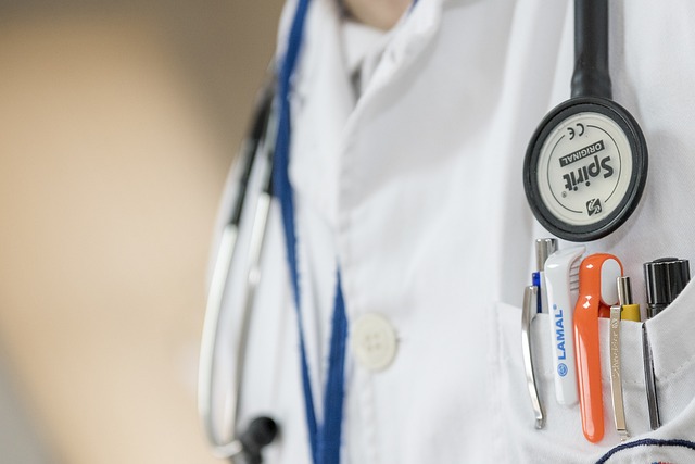 doctor jacket, stethoscope, pens